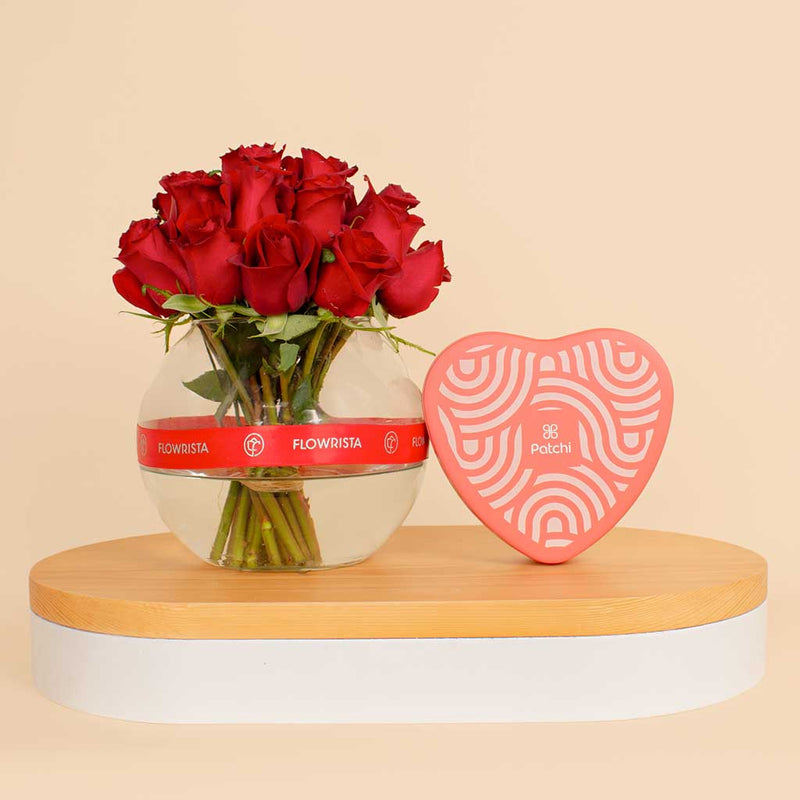 Patchi Tin Box of 22 Pieces | A vase of 20 red roses