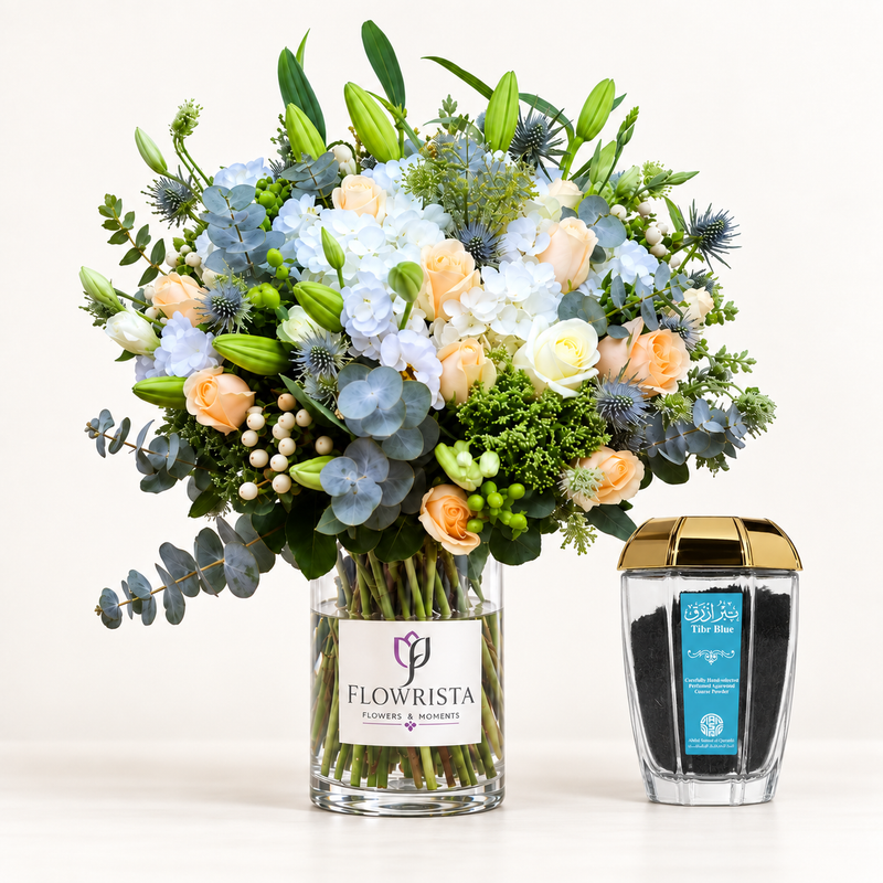 Shop Tibr Blue Perfumed Agarwood by Abdul Samad Al Qurashi paired with a luxury vase arrangement by Flowrista. A premium fragrance and floral gift set in UAE.