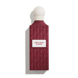 Red perfume bottle with white cap on a white background