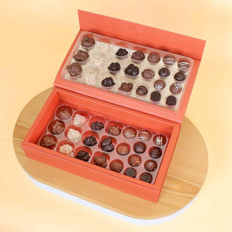 Patchi 46-Piece Box - Les Gourmets with Black Vase and Red Roses