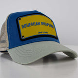 Levai & Loris Bohemian Rhapsody Cap with White Roses Vase