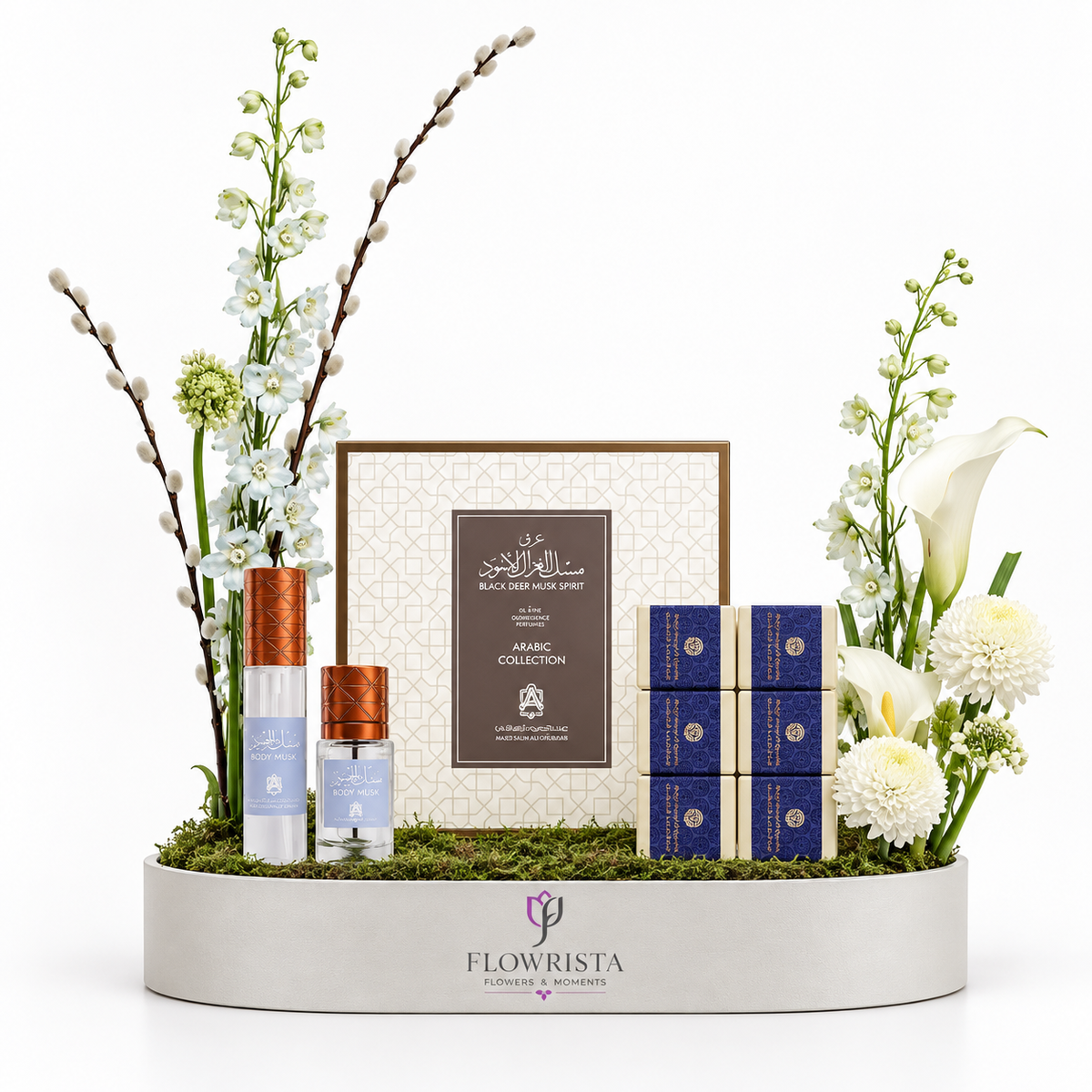 Shop Black Deer Musk Spirit by Abdul Samad Al Qurashi with white artificial flowers in a Flowrista tray. Luxury gift delivery in Dubai." — 136 characters ✅