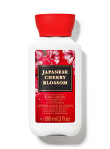 Body lotion bottle with red cap and Japanese Cherry Blossom label on a white background