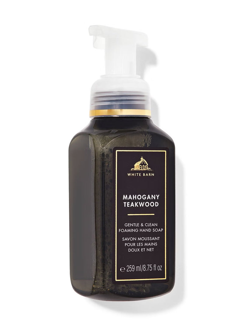 White Barn Mahogany Teakwood Gentle & Clean Foaming Hand Soap in a dark brown pump bottle with a black and gold label, on a white background.