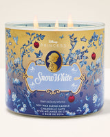 Snow White-themed candle with decorative design on a white background