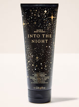 Body cream tube labeled 'Into the Night' by Bath & Body Works on a white background