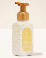 Disney Princess Life is Fairytale Self & Body Wash in a frosted white bottle with a metallic gold pump and a decorative gold label, set against a clean off-white background.