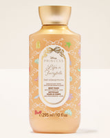 Disney Princess Life is a Fairytale Body Wash in a 10 fl oz bottle. The bottle is a warm peach-beige color with a metallic gold cap and features white lace illustrations and multicolored fairy accents on the label.