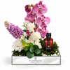 Shop Jasmin Cardamom Oriental 100ml by Abdul Samad Al Qurashi paired with a luxury mirror tray arrangement by Flowrista. A stunning floral fragrance gift set in…