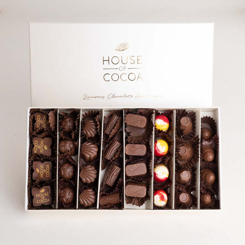 House of Cocoa Chocolate Box 48pieces and 20 red roses
