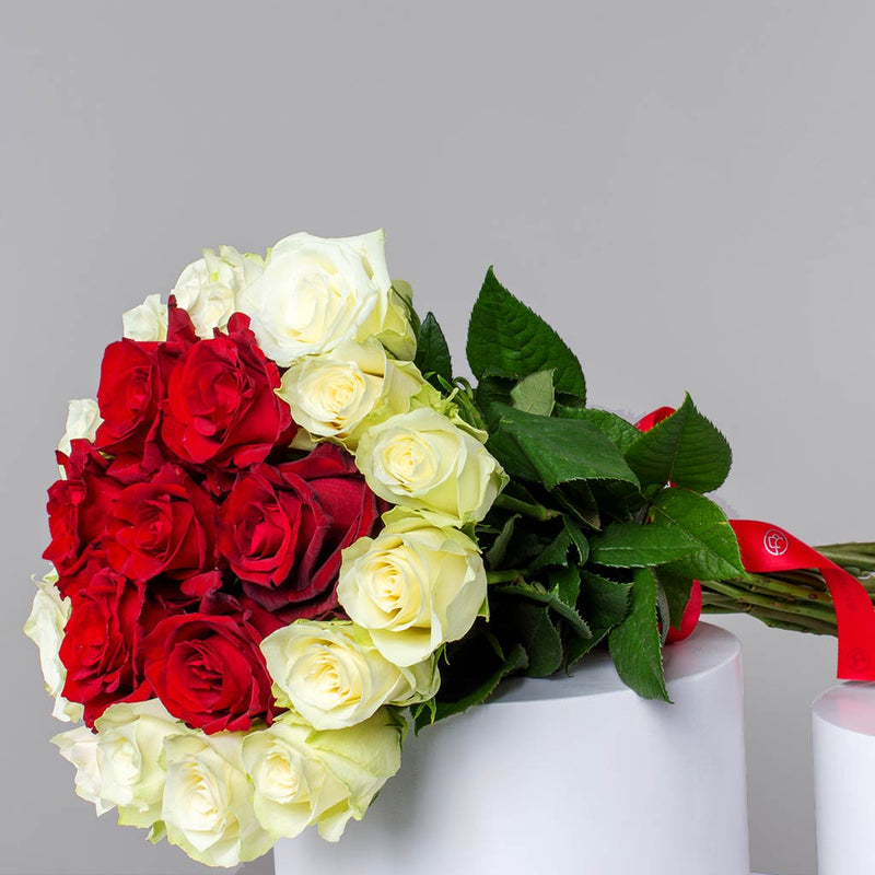 Nude Bakery cookies box and 22 roses