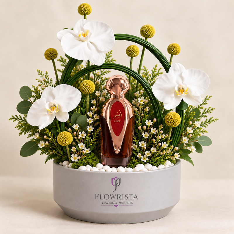 Asser Perfume with Artificial White Orchids & Yellow Flower Arrangement