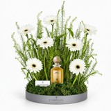 Body Oud Silk nestled low in flowers