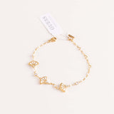 GUESS Fan Gold-Tone Charm Bracelet & Red Roses Bouquet