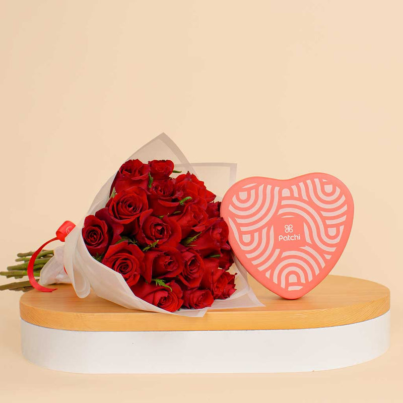 Patchi Tin Box of 22 Pieces and 20 red roses
