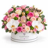 Pink Diamond Sakura perfume with roses and white orchids in a Flowrista graduation hatbox with Arabic topper