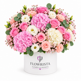 Flowrista white flower box with pink roses, pink hydrangeas, white flowers and greenery