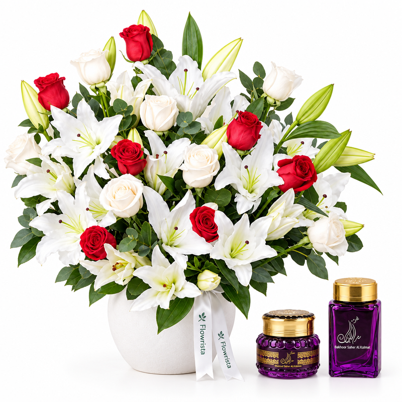Saher Alkalmet bakhoor and mamoul beside Flowrista red roses and white lilies in a white pot