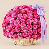 Flowrista basket of vibrant pink roses with lilac ribbon