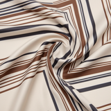 Close-up detail of Mango beige geometric printed satin foulard texture