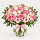 Flowrista pink and white rose bouquet in a clear glass vase