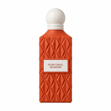 Nude Coral Diamond coral-orange faceted perfume bottle with white round cap