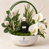 Black Carbon Diamond perfume with artificial white calla-style flowers and green arch in a white Flowrista bowl