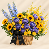 Flowrista wicker basket with yellow sunflowers and roses, purple chrysanthemums and pale blue flowers