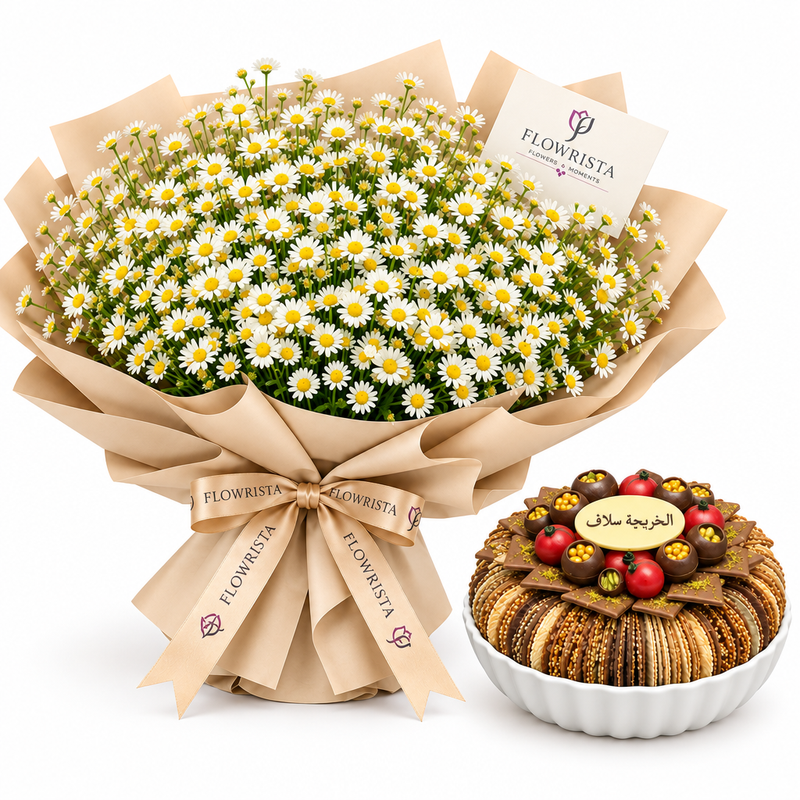 Flowrista white daisy bouquet beside caramelized sesame tray in white faceted plate