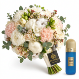 Brazilian Tobacco 100 ml perfume beside a Flowrista ivory and blush bridal bouquet