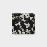 Mango black floral botanical print scarf with frayed finish on white background