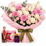 Asser perfume and Bakhoor Saher Alkalmet beside a Flowrista pink and white bouquet on a white background