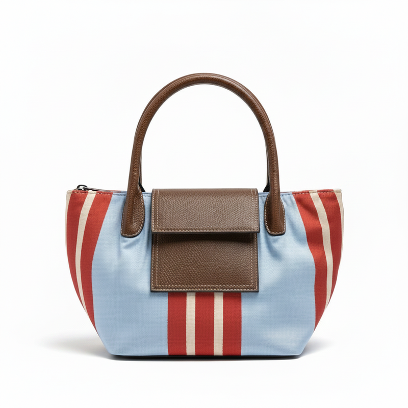 Parfois light blue striped tote bag with brown leather handles and front flap pocket