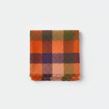 Mango orange wool checked plaid scarf with frayed hem on white background