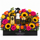 Kuwaiti perfume bakhoor and white air freshener with fresh sunflowers and colourful roses in a black Flowrista planter