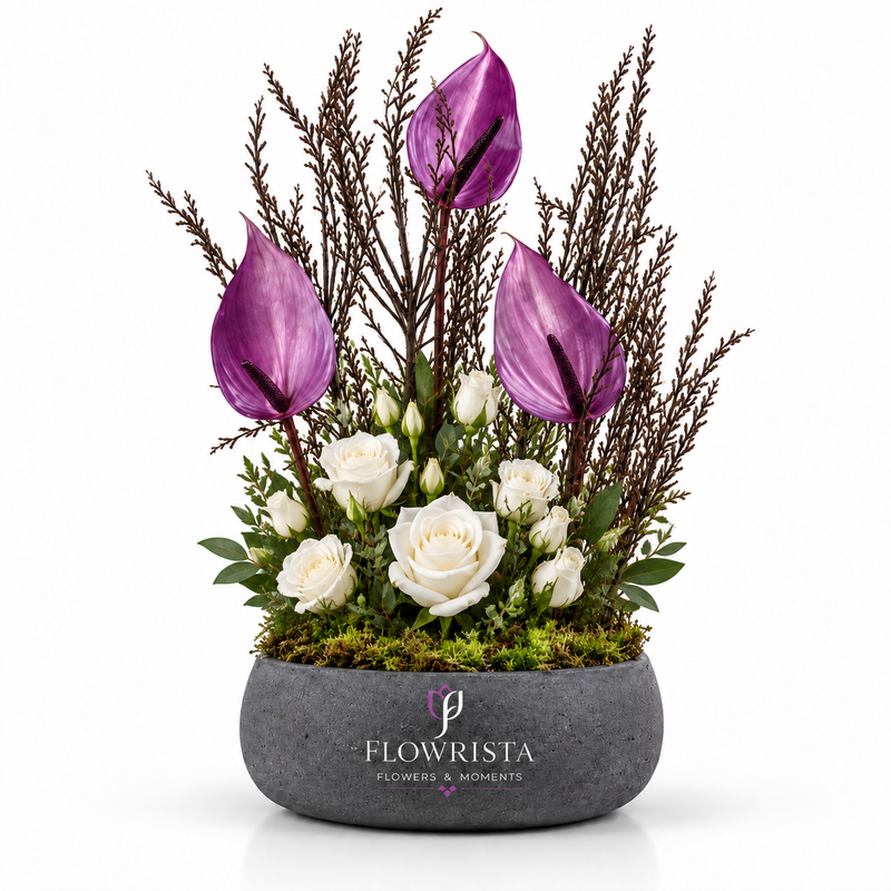 Flowrista purple anthurium and white roses arrangement in a grey stone bowl