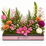 Artificial tulips, pink orchid and colorful mixed flowers in a rectangular Flowrista planter