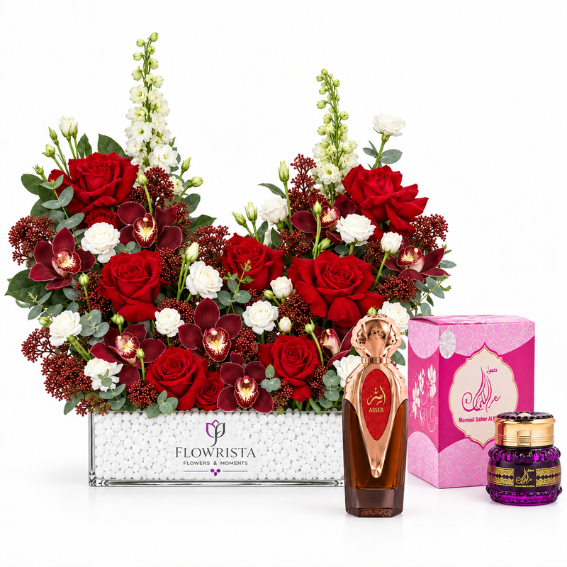 Asser perfume and Saher mamoul beside Flowrista red rose and burgundy orchid arrangement