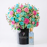 Blue Diamond Aqua 150 ml perfume beside blue and blush flowers in a black box featuring the Flowrista Flowers & Moments logo