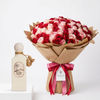Riviera Sunset perfume beside red and pink roses in brown wrapping with ribbons and a Flowrista tag