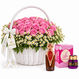 Asser perfume and Saher mamoul beside Flowrista pink rose and white daisy basket