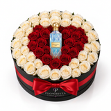 Blue Diamond Aqua perfume nestled in red heart-shaped roses framed by white roses in a black Flowrista hatbox