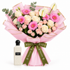 White Regent Diamond 150 ml perfume beside Flowrista pink gerbera and cream rose bouquet