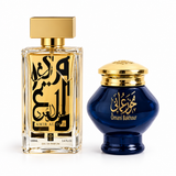 Amir Al Oud Gold perfume bottle beside Omani Bakhour dark blue jar with gold lid