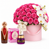 Asser perfume and Saher mamoul beside Flowrista pink rose and cascading white orchid hatbox