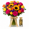 Amir Al Oud Gold perfume beside a Flowrista sunflower and colourful rose vase