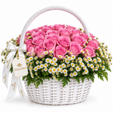 Flowrista pink roses and white daisies in a white wicker basket with handle