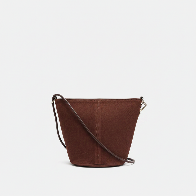 Parfois dark brown leather bucket bag with crossbody strap and magnetic closure