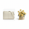 Parfois cream studded crossbody bag with Flowrista yellow craspedia box gift set Dubai