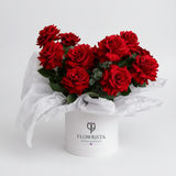 Flowrista fresh red roses in white cylindrical box with white tissue paper